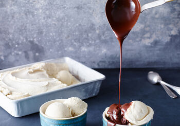 Homemade Vanilla Ice Cream With Warm Chocolate Sauce