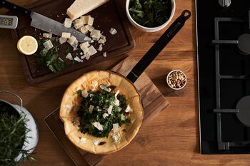 Hearty Dutch Baby with parsley salad